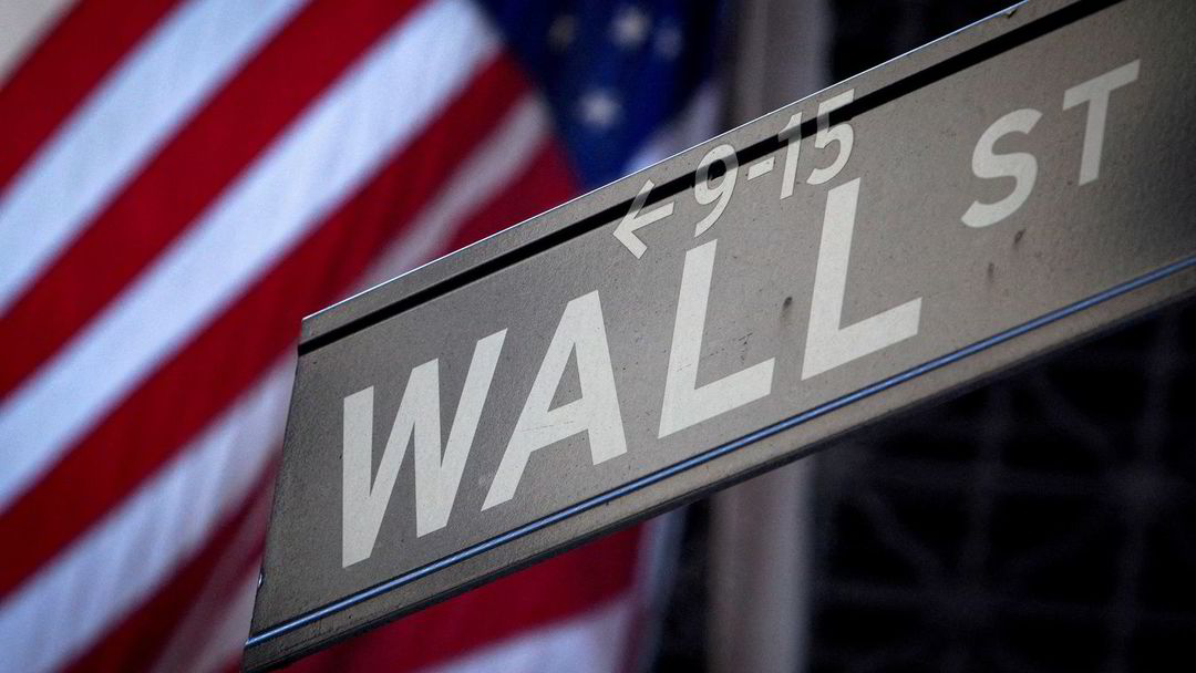 “Wall Street Dips as China’s Weaker Figures and Debt Talks Worry Investors”