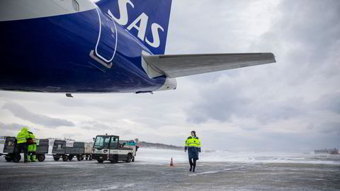 SAS er på vei inn i sine tyngste perioder noensinne. Her et fly før avgang i Bodø i mars i fjor.