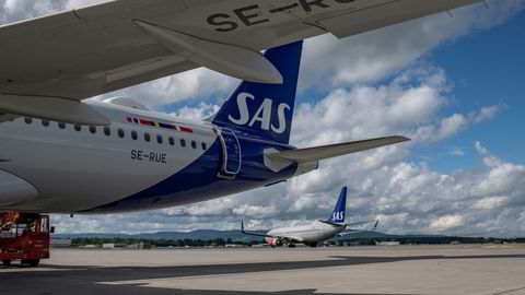 SAS kan måtte bli i det amerikanske rettsvesenet i ni til 12 måneder. Her er et SAS-fly på Oslo Lufthavn tidligere i sommer.