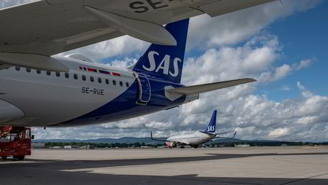SAS rapporterer regnskapet for mai, juni og juli. Her et SAS-fly klar til avgang i sommer.