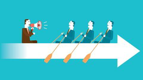 All male business executives with motivator rowing on white arrow sign.
