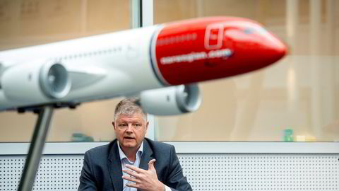 Flyselskapet Norwegian, her ved toppsjef Jacob Schram, skroter nå den manuelle refusjonsordningen som har ført til at kunder har måttet vente i flere måneder på å få pengene tilbake.