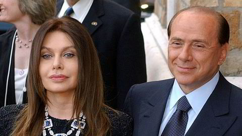 Italias tidligere statsminister vant ankesaken mot sin ekskone Veronica Lario. Bildet er fra da de fortsatt var gift. a