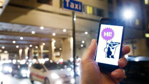 Høyesterett behandler Haxi-saken i dag. Den nye drosjeappen Haxi formidler kontakt mellom folk som trenger skyss, og folk som kan kjøre. Foto: Heiko Junge /