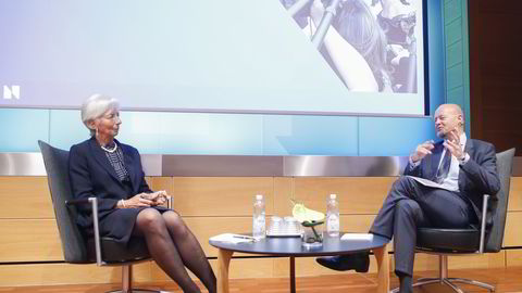 IMF-sjef Christine Lagard og oljefondsjef Yngve Slyngstad i samtale under torsdagens jubleumssymposium i Norges Bank. Foto: Terje Pedersen /