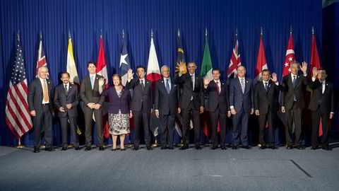 USA og 11 land rundt Stillehavet signerte nylig en ny og omfattende samarbeidsavtale (TPP), her alle lederne i TPP på Møtet i Manila med Barack Obama i midten. Foto: Saul Loeb/AFP/NTB Scanpix