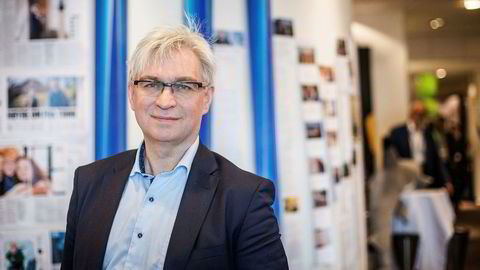 André Skjelstad vil at flere større kommuner i regionsentrene skal slå seg sammen.