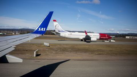 SAS- og Norwegian-fly på Oslo Lufthavn. Foto: Gunnar Blöndal