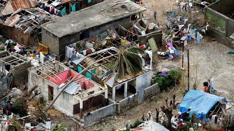 Fredag ettermiddag var 478 mennesker bekreftet omkommet på Haiti, ifølge Reuters. 
                  Foto: Carlos Garcia Rawlins/Reuters/NTB Scanpix