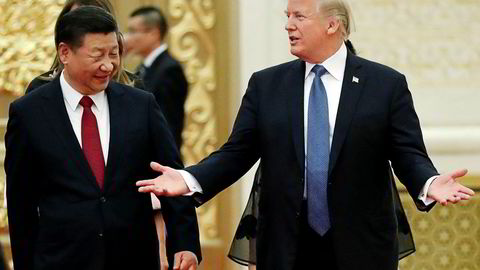 Handelskrigen mellom Kina og USA kan påvirke mellomvalget i USA til høsten, frykter analytiker. Her fra møtet mellom president Xi Jinping og president Donald Trump i Beijing i fjor.