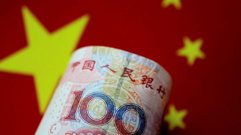 FILE PHOTO: A China yuan note is seen in this illustration photo May 31, 2017. REUTERS/Thomas White/Illustration/File Photo