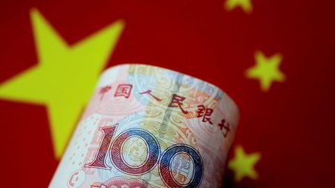 FILE PHOTO: A China yuan note is seen in this illustration photo May 31, 2017. REUTERS/Thomas White/Illustration/File Photo