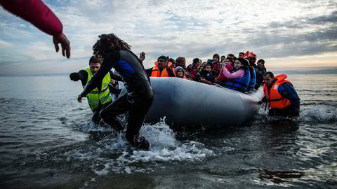 Politisjefer i Slovenia, Østerrike, Makedonia, Serbia og Kroatia er enige om å begrense migrantstrømmen til rundt 580 personer per dag, ifølge slovensk politi. Foto: Manu Brado/AP/NTB Scanpix