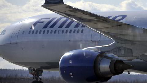 Finnair fraktet 790.800 passasjerer i desember. Arkivbilde av et Finnair-fly på Helsinki International airport. Foto:JUSSI NUKARI/Scanpix