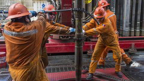 Oljearbeidere på en borerigg i Mexico-gulfen.Oljepris oljerigg Foto: Omar Torres/AFP Photo/NTB scanpix