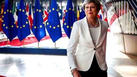 Storbritannias statsminister Theresa May sliter med splittelse i egen regjering foran fredagens varslede tale om veien videre for brexit-forhandlingene. Her er May avbildet når hun ankommer et EU-møte i Brussel i juni i år.