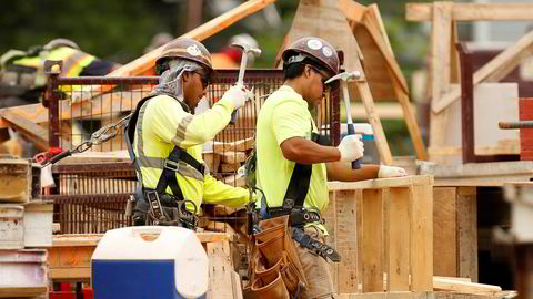 Fredag ble den offisielle jobbrapporten fra amerikanske myndigheter publisert. Bildet er fra en byggeplass i Silver Spring i Maryland tidligere denne måneden. Foto: Gary Cameron / REUTERS / NTB SCANPIX