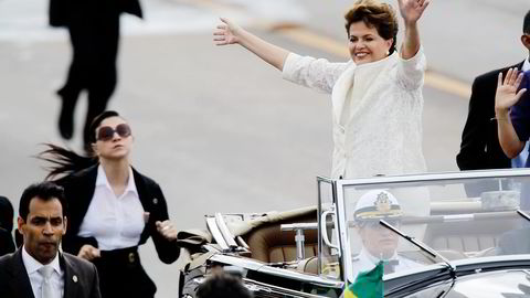 Dilma Rousseff vant fire nye år ved makten i Brasil. Markedene reagerte med frykt og avsky, mens Rousseff kom med en utstrakt hånd om samarbeid. Foto: Silvia Izquierdo, AP/NTB Scanpix