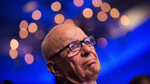 Rupert Murdoch, chairman of News Corp., listens as U.S. President Barack Obama, not pictured, speaks at the Wall Street Journal CEO Council annual meeting at the Four Seasons Hotel in Washington, D.C., on Tuesday, Nov. 19, 2013. Obama said the U.S. can cut the deficit and spur economic growth at the same time, and that short-term deficits aren't the nation's primary fiscal concern. Photographer: Drew Angerer/