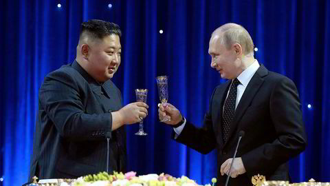 In this Thursday, April 25, 2019, photo provided by the North Korean government, North Korean leader Kim Jong Un, left, toasts with Russian President Vladimir Putin in Vladivostok, Russia. The content of this image is as provided and cannot be independently verified. Korean language watermark on image as provided by source reads: _KCNA_ which is the abbreviation for Korean Central News Agency. (Korean Central News Agency/Korea News Service via AP)