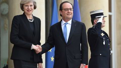 Frankrikes president Francois Hollande krever at Storbritannia og statsminister Theresa May kommer seg ut av EU snarest.
                  Foto: STEPHANE DE SAKUTIN/AFP/NTB Scanpix