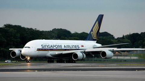 Et Airbus A380-fly fra Singapore airlines lander ved Changi flyplass i Singapore. Foto: AP / NTB scanpix