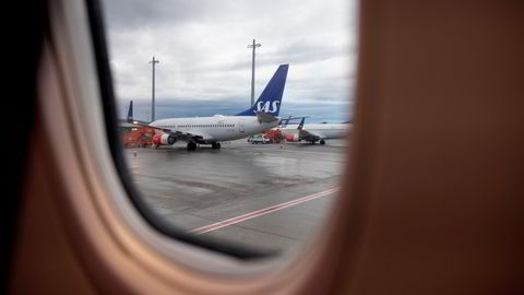 SAS' finansielle rådgivere jobber nå på overtid for å finne nye eiere på vei ut av konkursprosessen som pågår. Her fra Oslo lufthavn.