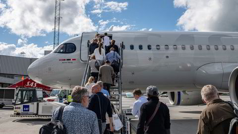 Rundt 2,5 millioner norske forbrukere, eller nærmere annenhver nordmann, er i dag Eurobonus-medlemmer, ifølge selskapet. Her er SAS-passasjerer på vei fra Oslo til Stockholm.