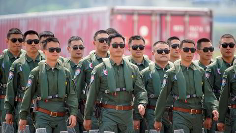 Kinesiske jagerflypiloter deltar på flyoppvisningen Airshow China i september 2021.
