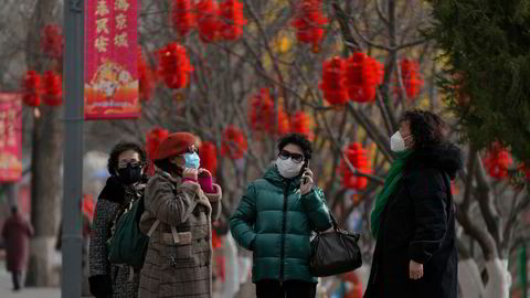 Kina gjør seg klar til å ønske harens år velkommen. Det er store, omfattende smittebølger i store deler av landet. Her fra hovedstaden, Beijing, torsdag 19. januar.