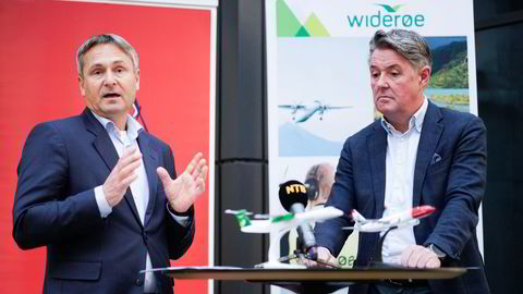 Widerøe-sjef Stein Nilsen (fra venstre) og Norwegian-sjef Geir Karlsen går hardt ut mot Konkurransetilsynet før en endelig avgjørelse om Norwegian får kjøpe Widerøe.