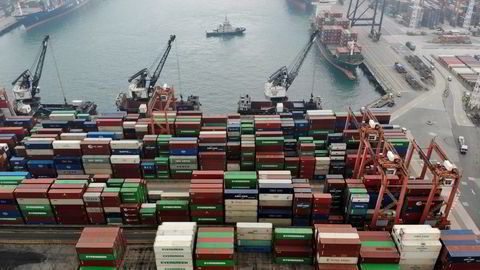 Global shipping rates have returned largely to pre-pandemic levels after increasing by more than five times during the lockdowns. An aerial view shows containers and ships at the Kwai Chung Container Terminal in Hong Kong, China.