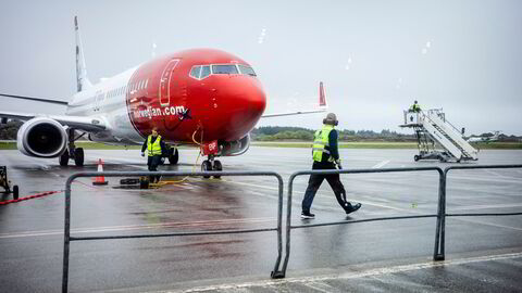 Norwegian-fly og -passasjerer på Haugesund lufthavn, fotografert ved en tidligere anledning.