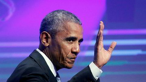 Barack Obama i Tyskland i mai. Nå er presidenten i mediene etter å ha tjent fett på taler for Wall Street-selskaper.
