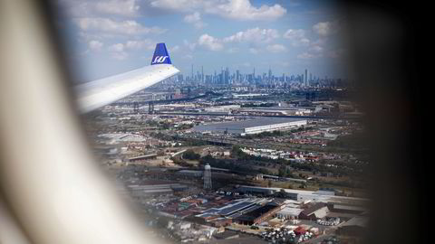 Nederst på Manhattan i New York ligger U.S. Bankruptcy Court, der aller siste rettshøring holdes tirsdag. Her er Manhattan i bakgrunnen under landing på Newark-flyplassen utenfor byen.