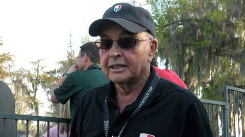 Joe Lewis fotografert under en golfturnering i Windermere i Florida i 2011. Nå er han tiltalt for å ha organisert innsidehandel.