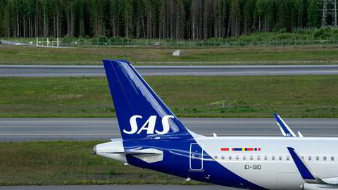 Bilde av SAS-fly på Oslo Lufthavn i sommer.