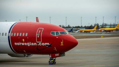 På en pressekonferanse mandag opplyste Norwegian-sjefen at selskapet kun har syv fly i drift. Bildet er tatt på Gardermoen på en tid da Norwegian hadde litt flere fly på vingene.