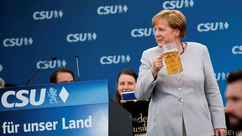Angela Merkels parti er i ferd med å danne regjering.