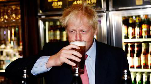 UK’s supply of food-grade CO2, a byproduct of ammonia production, is critical to sectors from beer and soft drinks to food packaging and meat. Boris Johnson, the U.K. Prime Minister, drinks beer from a pint glass during a campaign tour, in London in 2019.