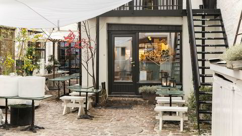 Nyoppussede Kolonihagen Frogner deler en hyggelig, frodig bakgård med en blomsterbutikk