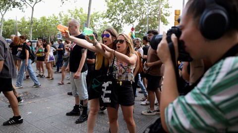 Turister ble dusjet med vannpistoler under nylige demonstrasjoner i Barcelonas hovedgate, La Rambla.